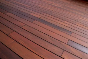 Smooth wooden deck surface with clean, polished, and evenly spaced tiles. -deck tile installation